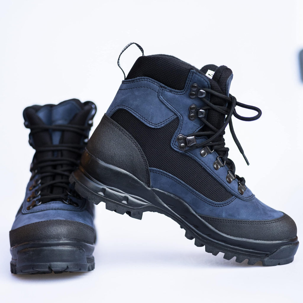 6. Pair of Samelin 550 Navy hiking boots in studio, highlighting waterproof materials and rugged build