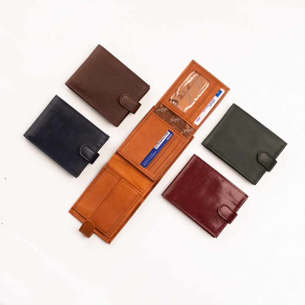 2. Open Papillon Leather Wallet No. 29-12 displaying card slots, ID window, and compartments, surrounded by closed wallets in different colors