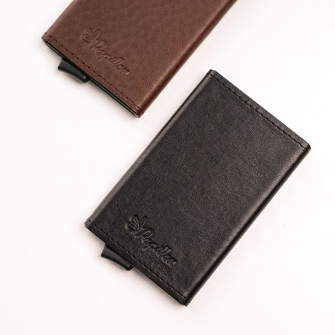 1. Papillon Card Holder No. 40 in black and brown leather, showcasing sleek design and embossed logo