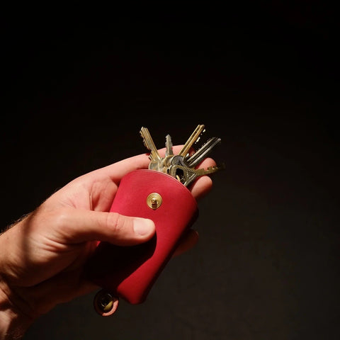 2. Mirgoods red keyholder with keys, highlighting spacious capacity and sleek design