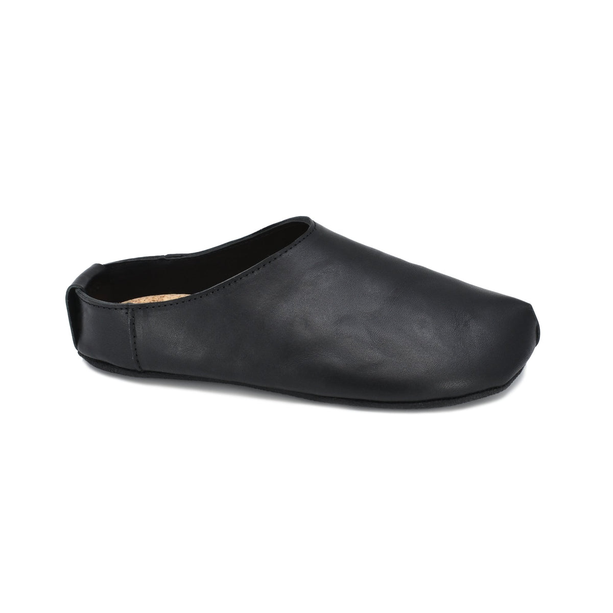 3. Studio shot of Kyoto black slipper by Omaking, side view highlighting minimalist design and vegetable-tanned leather