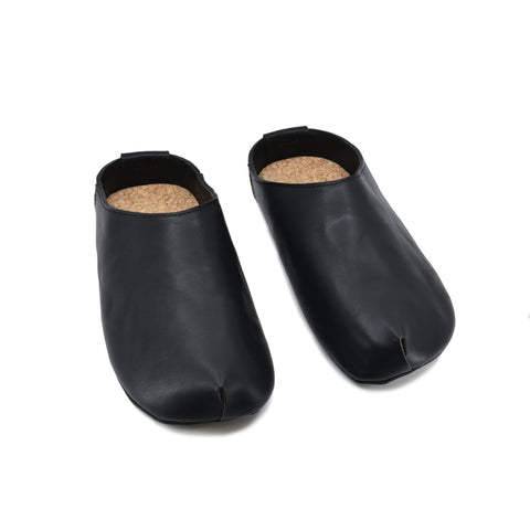 3. Studio shot of Kyoto black slipper by Omaking, showing side view and minimalist design