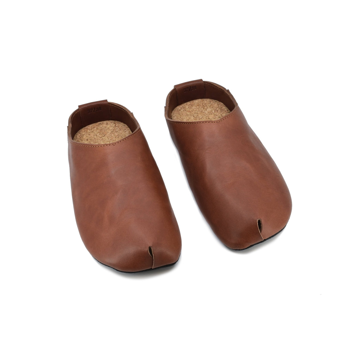3. Studio shot of single Kyoto brown slipper by Omaking, highlighting vegetable-tanned leather