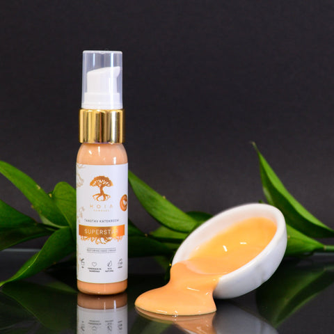 2. HOIA homespa Restoring Hand Cream SUPERSTAR, 30ml bottle with cream texture displayed in a dish, surrounded by green leaves