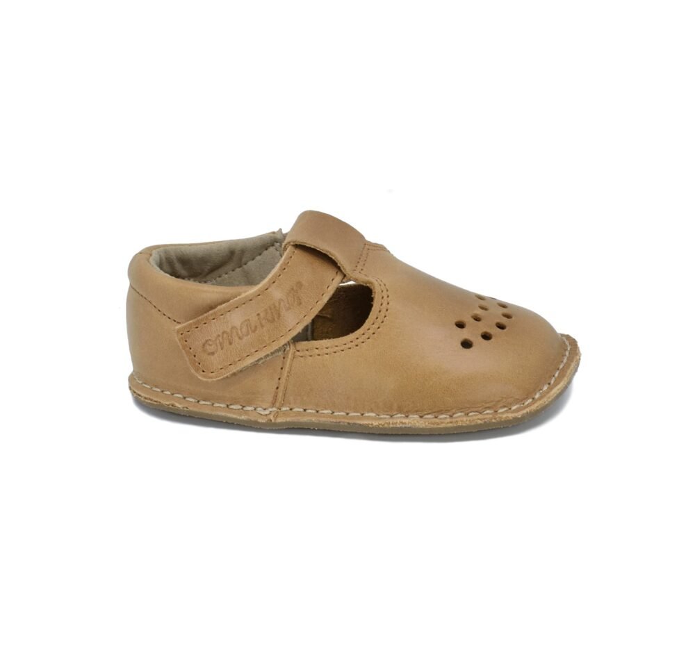 1. Single Lusti leather kids' shoe in tan with Velcro fastener and air holes, shown in studio