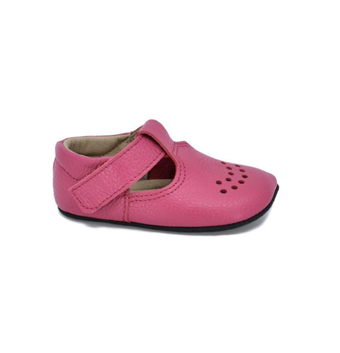 2. Side view of kids' Mutsu slipper in fuchsia by Omaking, highlighting breathable air holes and durable anti-slip sole