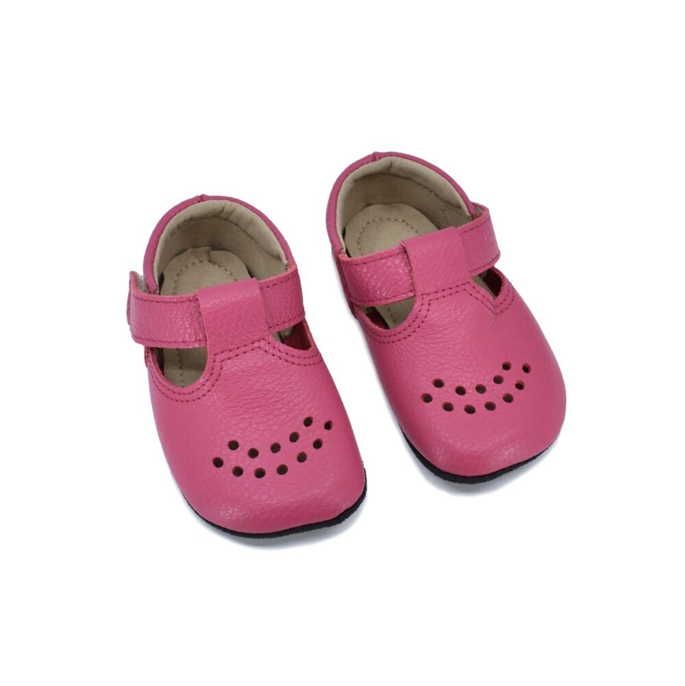 1. Kids' Mutsu slippers in fuchsia by Omaking, featuring extra soft leather upper and adjustable Velcro fastener, shown in studio setting