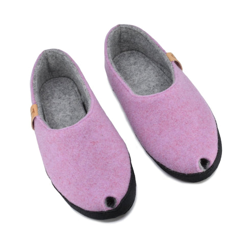 2. Pair of women's TOKU Budapest slippers in light pink, top view highlighting peek-hole design and arch support insole