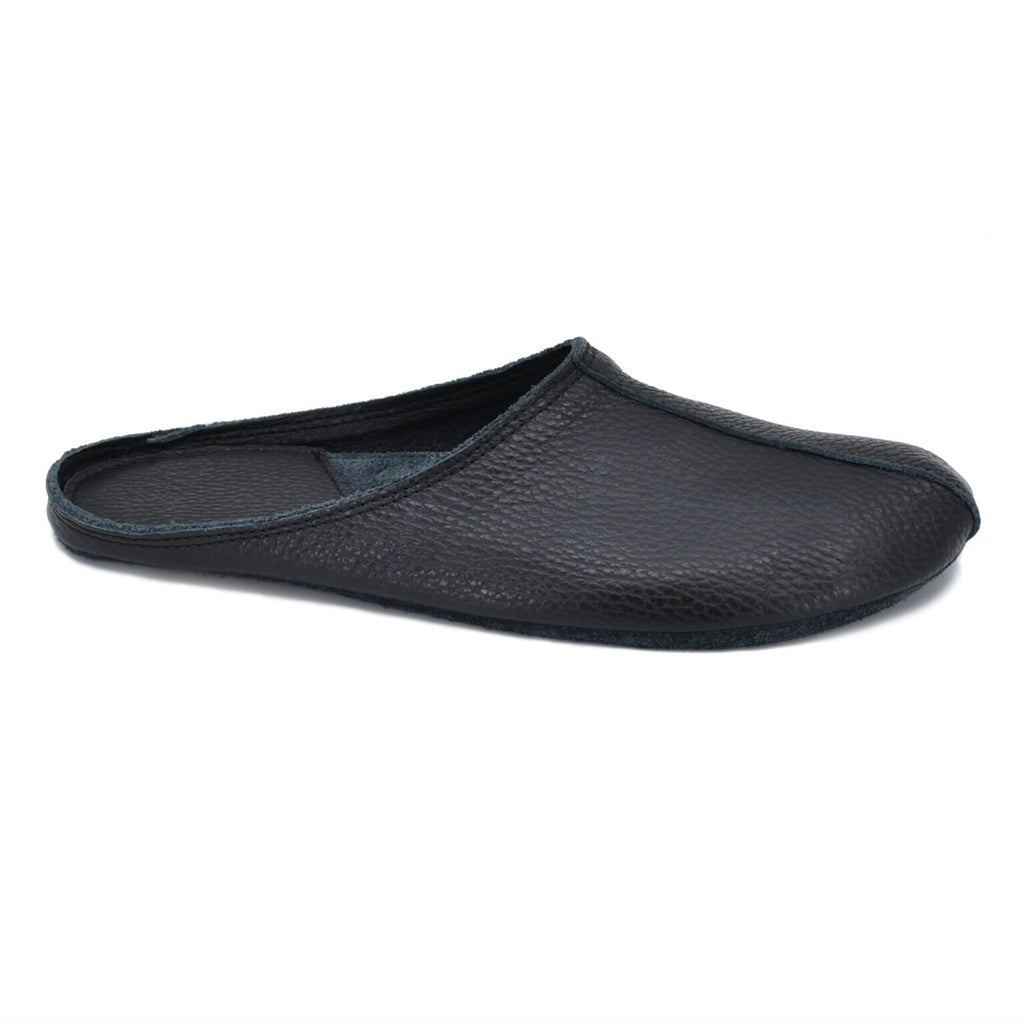 1. Omaking Sulbi black leather slippers shown in side view, highlighting smooth texture and wide toe area