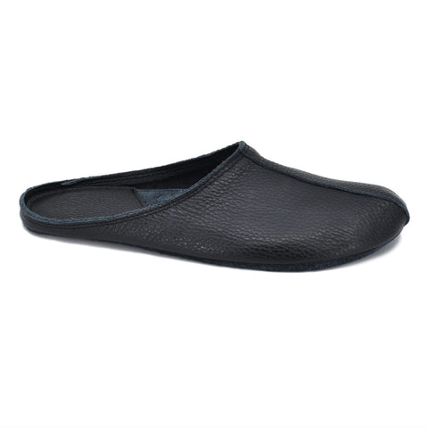 1. Omaking Sulbi black leather slippers shown in side view, highlighting smooth texture and wide toe area