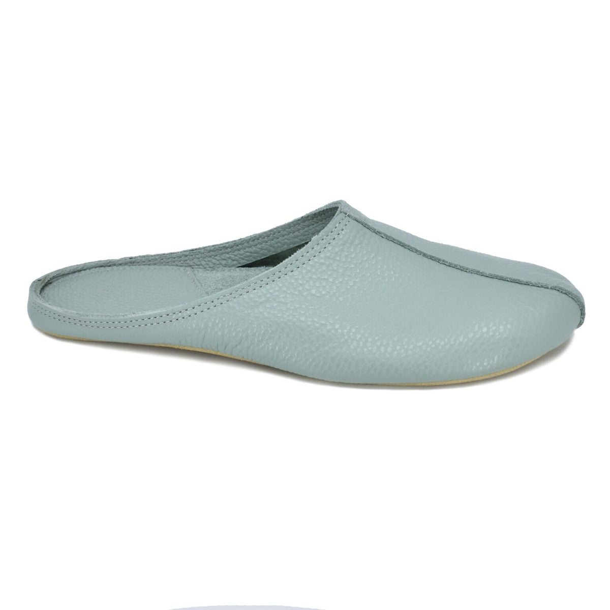 2. Studio shot of mint Sulbi slippers by Omaking, highlighting smooth leather upper and wide toe area