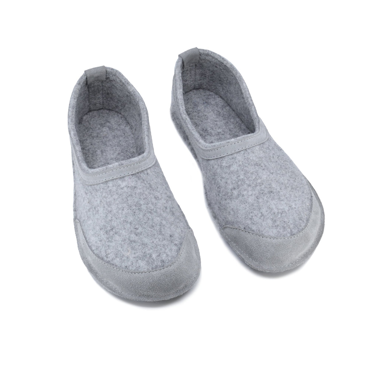 4. Studio image of unisex gray felt barefoot indoor slippers by Omaking with closed toe design