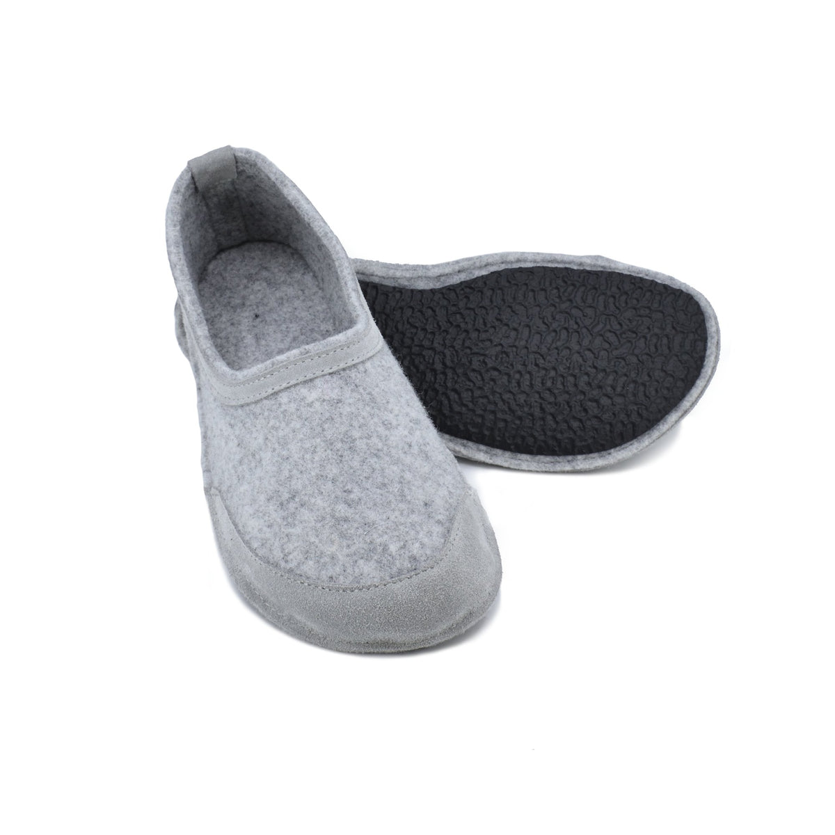 3. Studio image of unisex gray felt barefoot indoor slippers by Omaking showing rubber sole