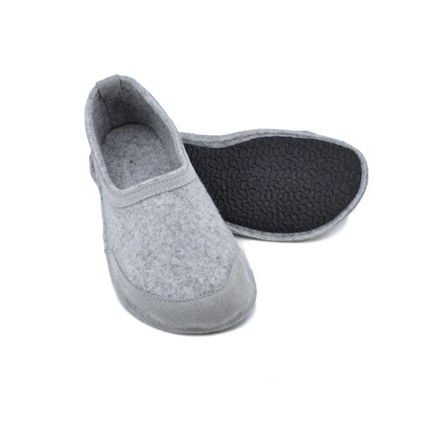 3. Studio image of unisex gray felt barefoot indoor slippers by Omaking showing rubber sole