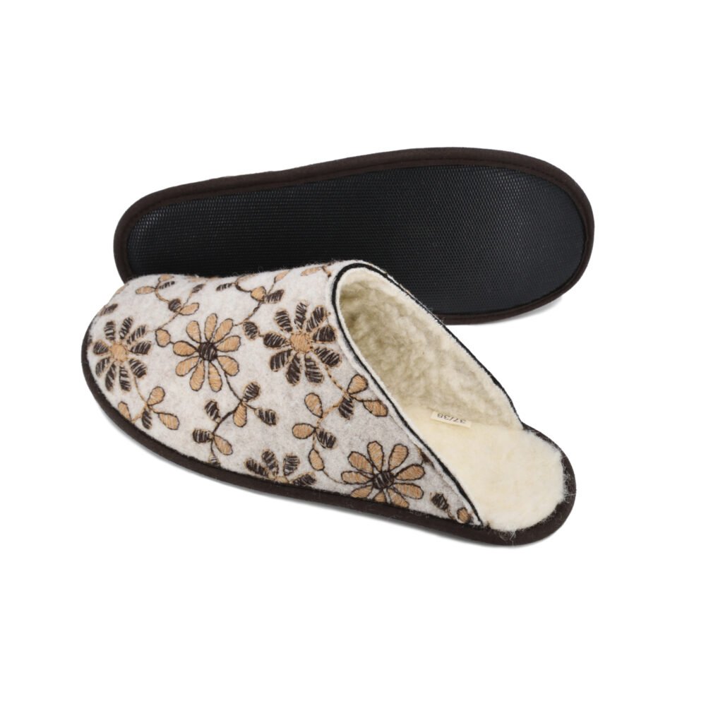 1. Jugu handmade slippers with floral pattern, natural felt upper, and wool lining by Omaking, shown in studio setting
