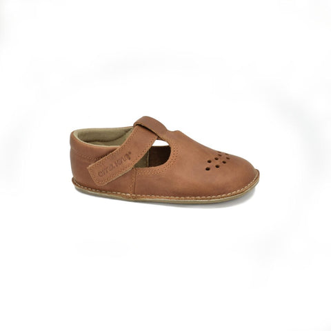 1. Omaking Lusti leather kids' shoe in brown with Velcro fastener and air holes, shown in studio