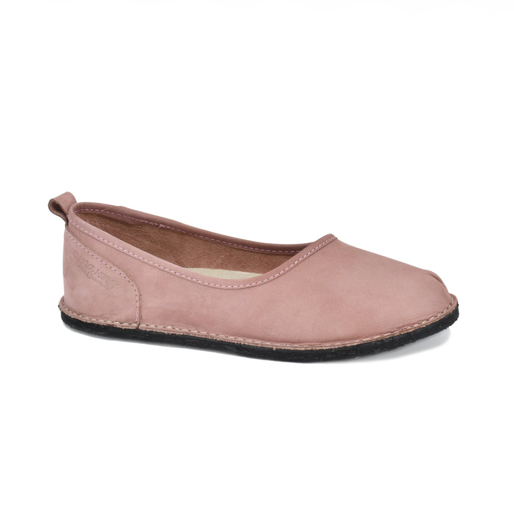 2. Side view of pink Kuutsid Shoes by OmaKing, featuring soft nubuck leather and ergonomic design, studio setting