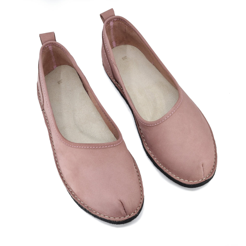 1. Women's Kuutsid Shoes in pink nubuck leather by OmaKing, shown in studio with ergonomic insole and lightweight EVA rubber outsole