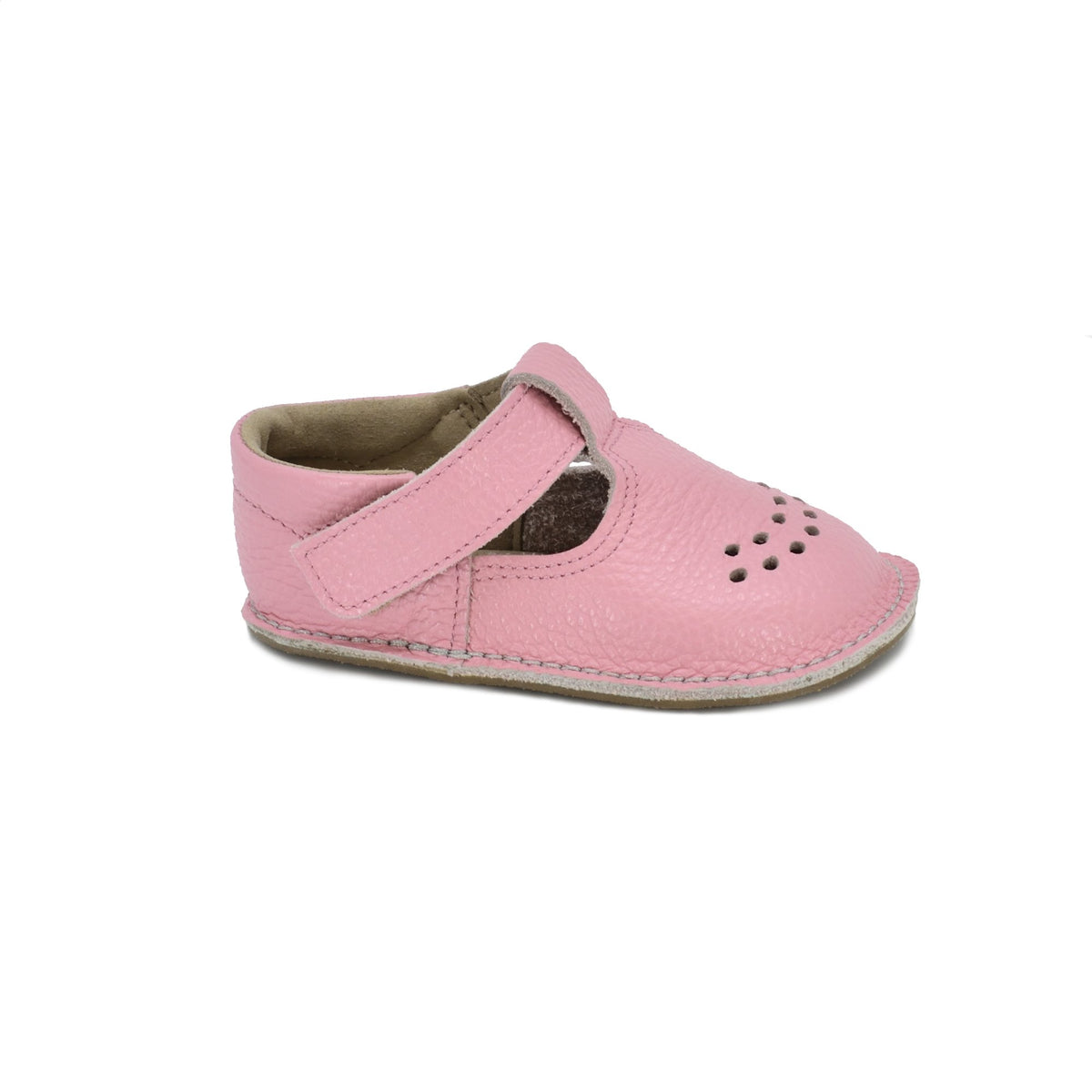 2. Omaking Lusti pink leather kids' shoe with Velcro fastener and breathable air holes, side view