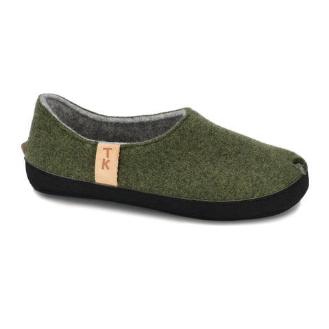1. Omaking TOKU Budapest slippers in moss green, side view showing closed heel and toe design, made from natural lambswool felt