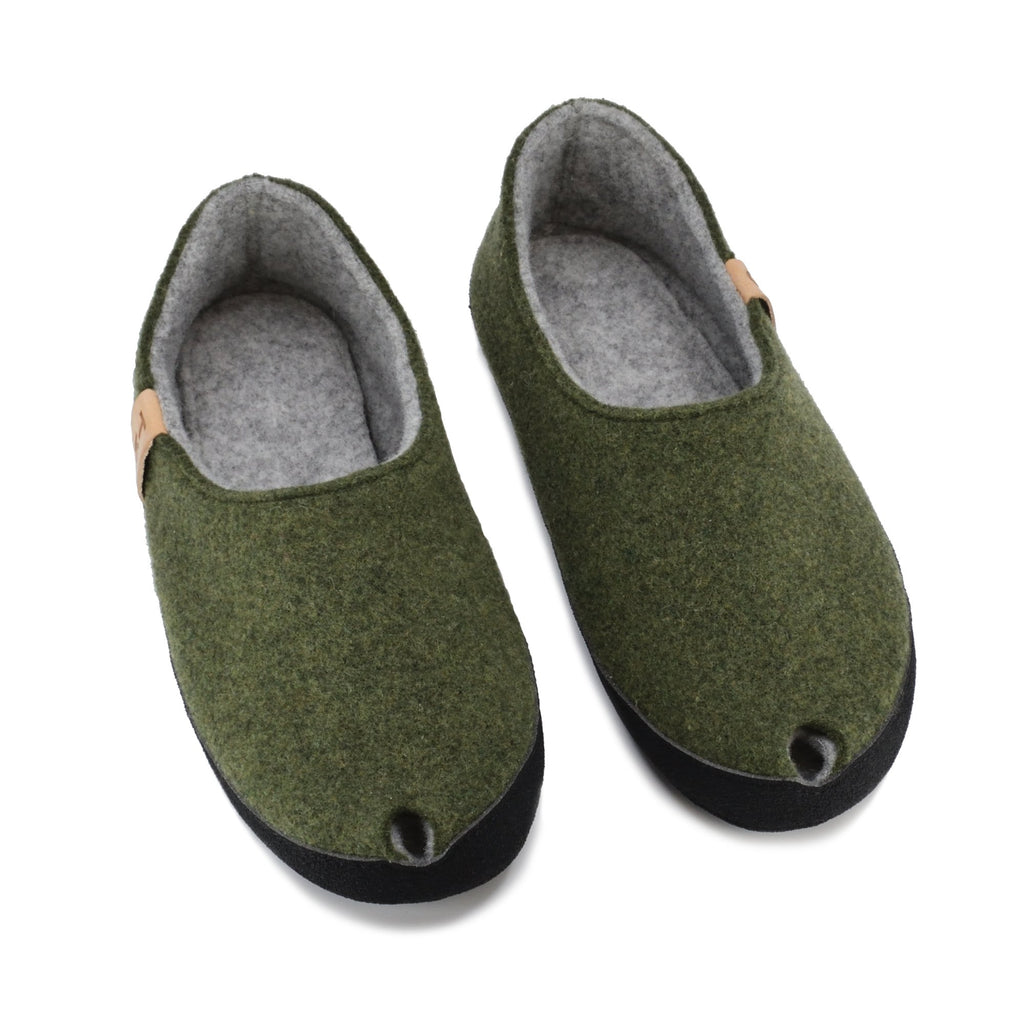 2. Pair of Omaking TOKU Budapest slippers in moss green, top view highlighting peek-hole design and arch support insole