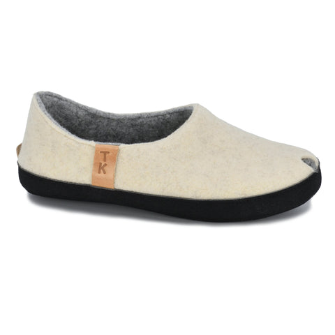 2. Side view of TOKU Budapest Slippers in natural white, featuring peek-hole design and TK branding