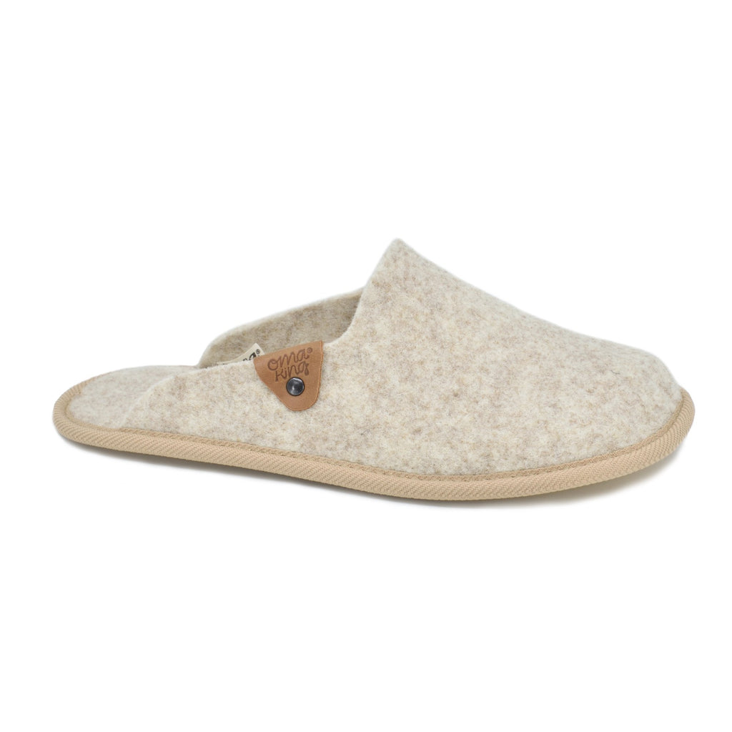 1. Omaking natural felt slippers in new beige with leather details, side view
