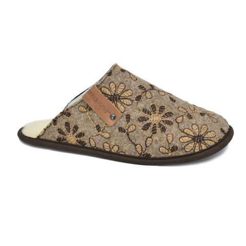 1. Omaking Jugu Slippers in natural felt with floral pattern, side view showing embroidered design and wool lining