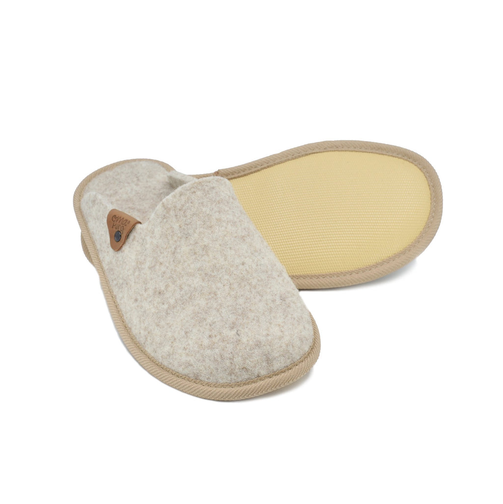 3. Omaking natural felt slippers in new beige showing rubber outsole