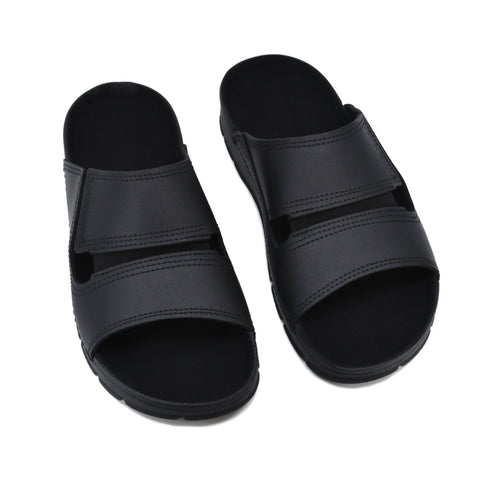 5. Pair of black Miku sandals by Omaking shown from above in studio setting