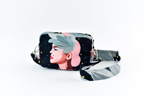 2. Garbanota Valerie shoulder bag with wide strap, featuring exclusive illustration, shown in studio setting