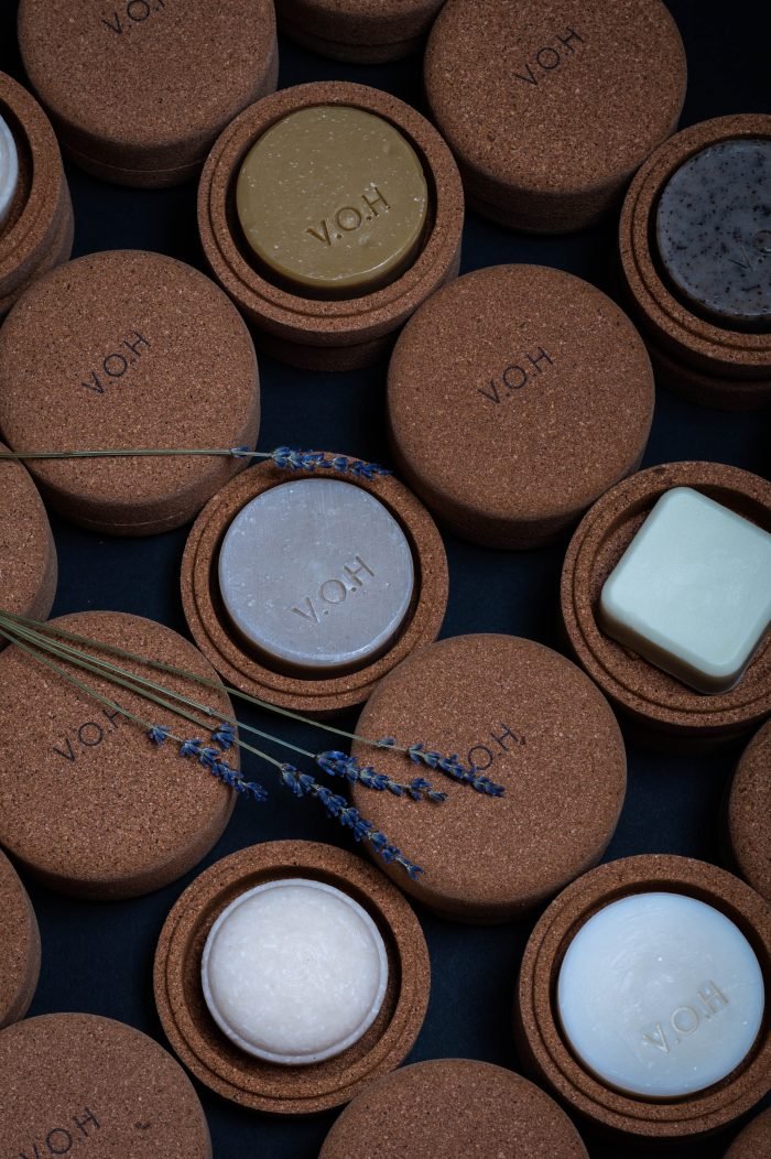 6. Assorted V.O.H solid beauty products with lavender sprigs