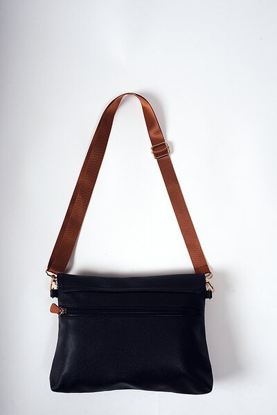5. Studio shot of Ally Scandic Black Coffee handbag with adjustable strap, emphasizing lightweight and durable design