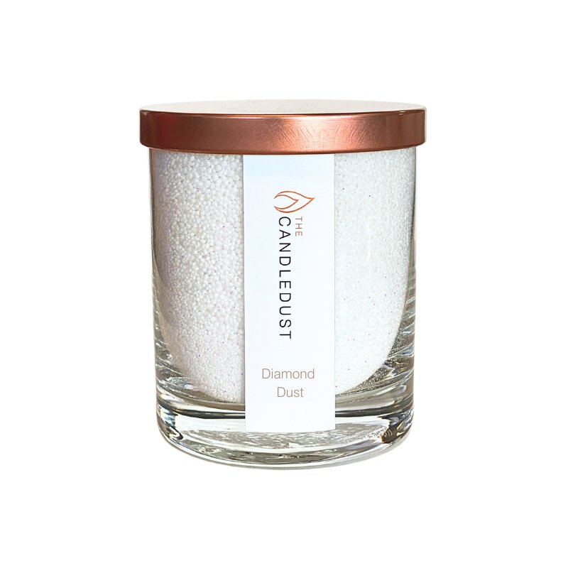 3. Studio image of Candledust Diamond Dust powdered candle in transparent glass with rose gold lid