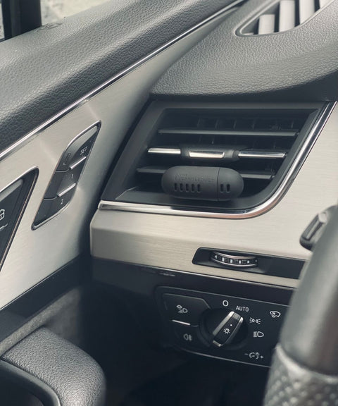 5. Candledust Breeze car diffuser installed in car interior, emphasizing modern elegance