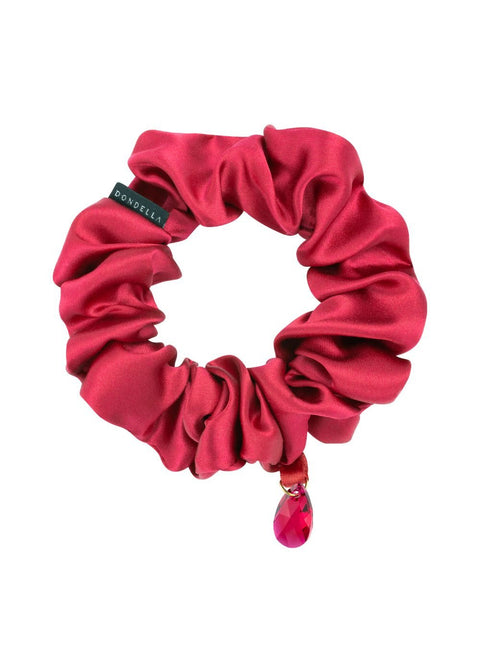 1. Dondella luxury silk scrunchie in vibrant red with jewel detail, made from 100% organic Mulberry silk, shown in studio setting