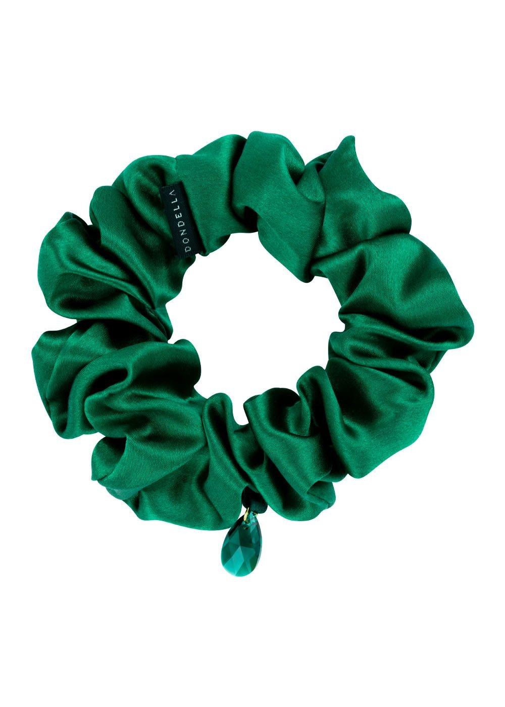 2. Dondella luxury silk scrunchie in green with a decorative charm, shown in a studio setting