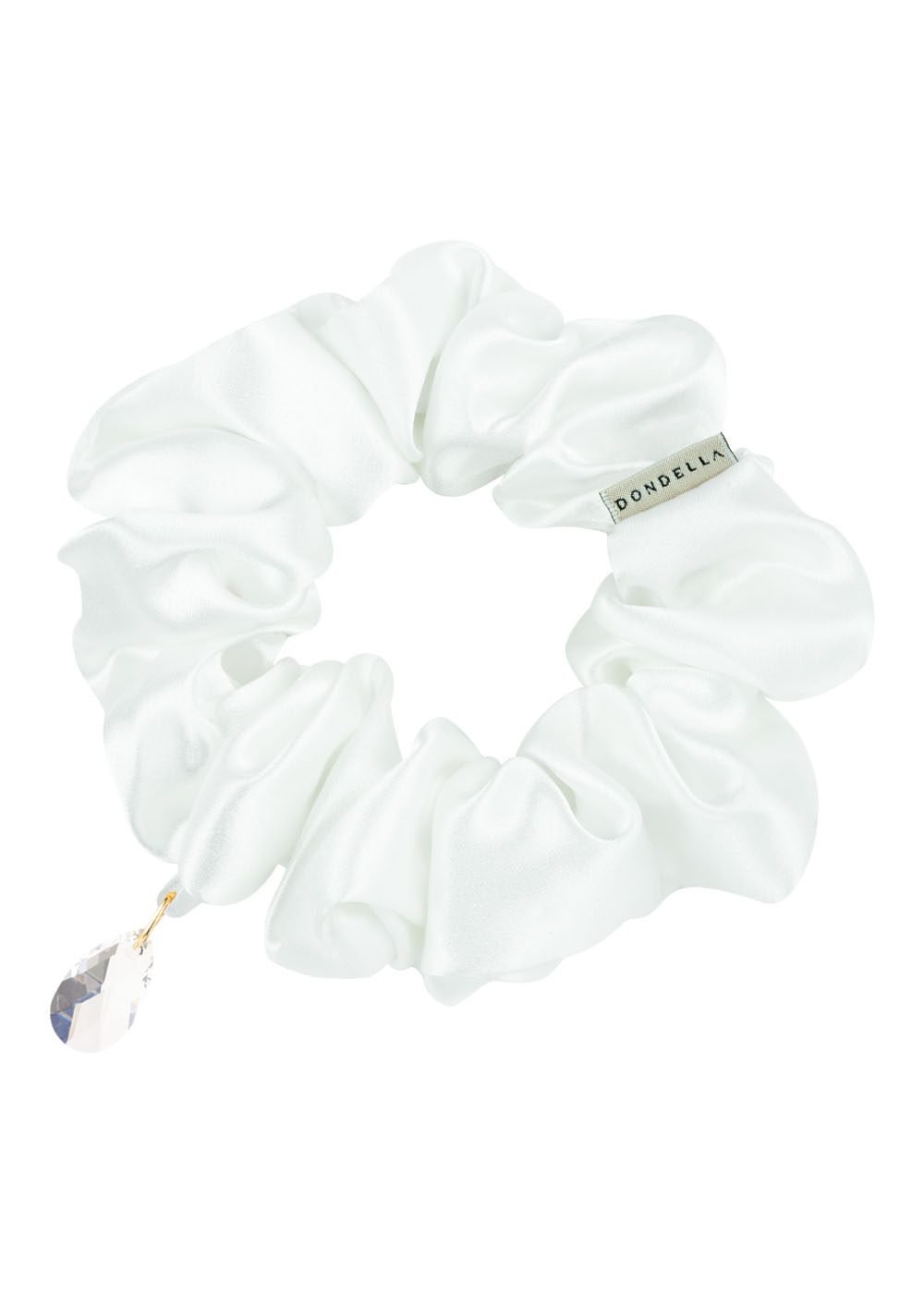 1. Dondella luxury silk scrunchie in white, made from 100% organic Mulberry silk, shown in studio setting with brand tag visible