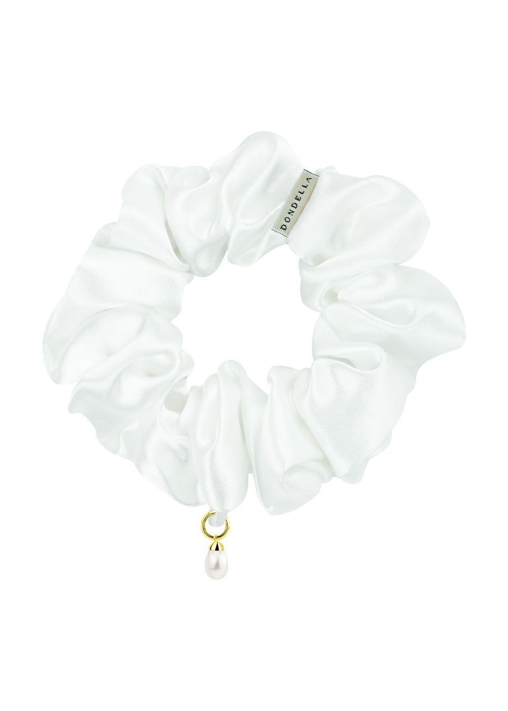3. Studio image of Dondella Mulberry Silk Scrunchie in Pearl with pearl charm, showcasing luxurious organic silk