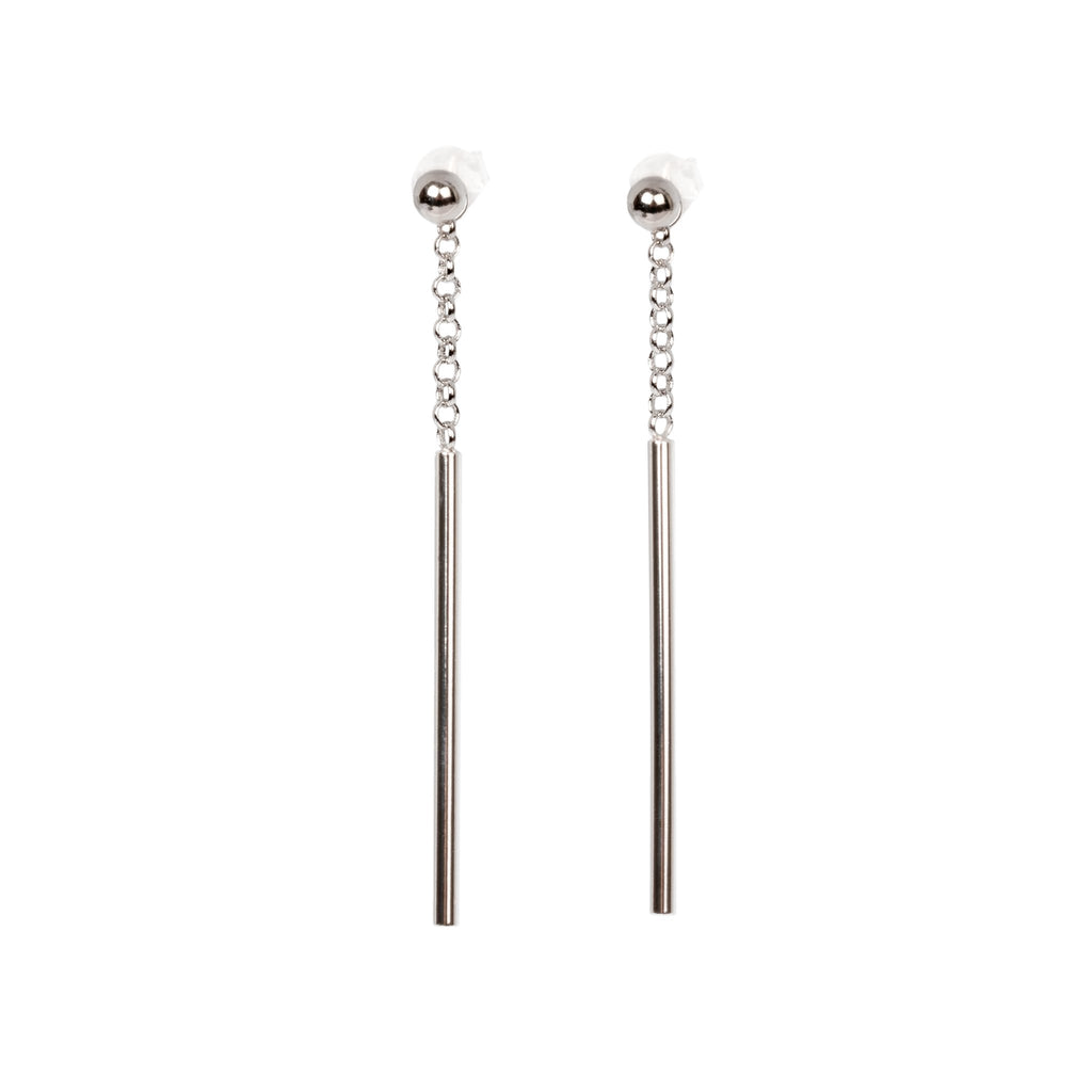 2. Studio image of MyaMoon Dots Falling Earrings in silver, featuring trendy long drop design