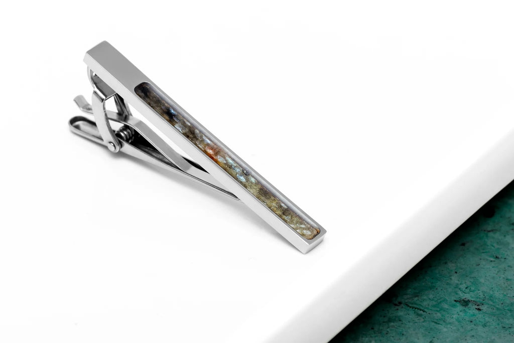 3. Stainless steel tie clip with unique fish scale pattern on white and green background