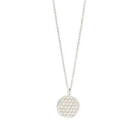 4. Studio image of New Vintage by Kriss Flower Of Life necklace in silver, highlighting sacred geometry design