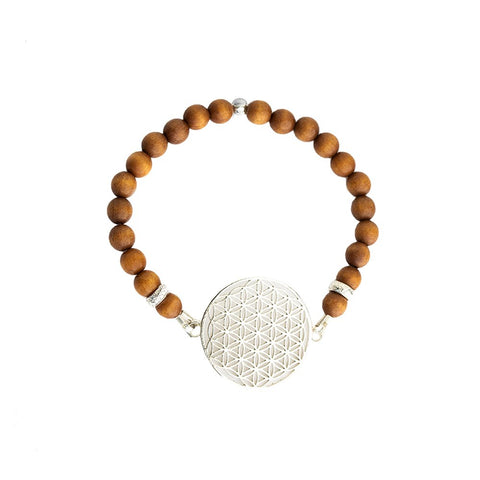 3. New Vintage by Kriss Flower Of Life Bracelet in sandalwood with 925 silver medallion, studio shot
