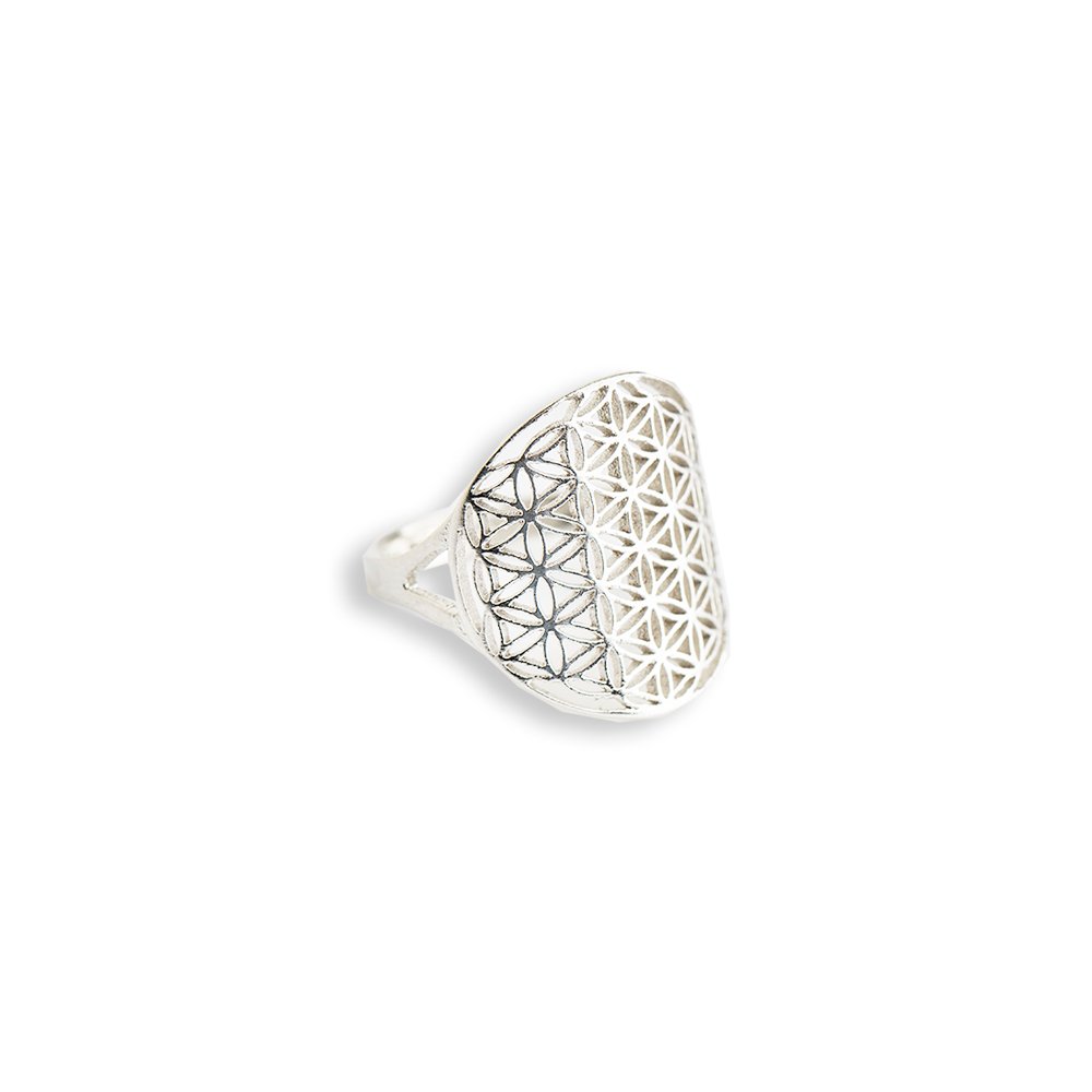 7. Studio image of silver Flower Of Life Ring by New Vintage by Kriss, showcasing geometric pattern