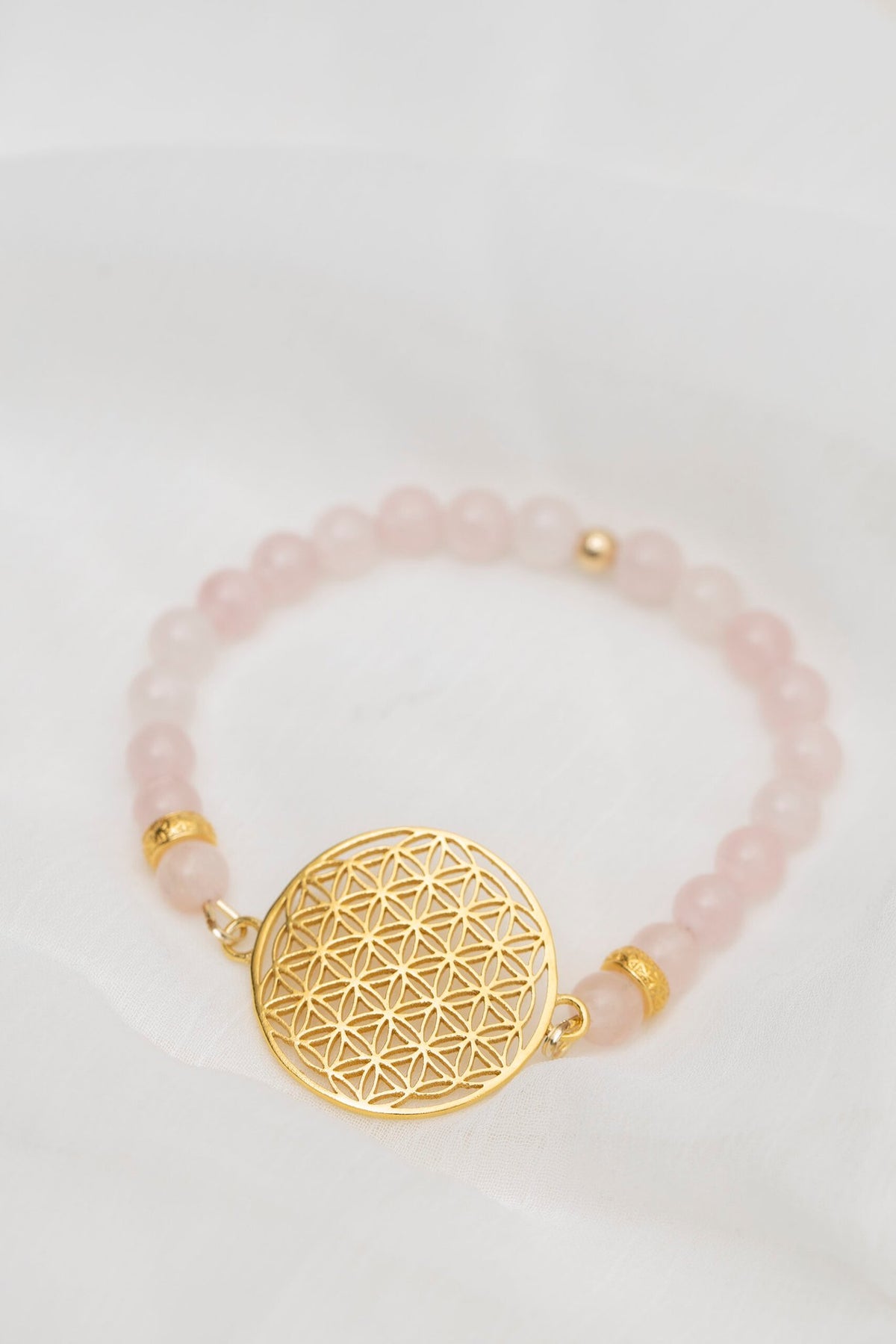 1. Flower Of Life bracelet in rose quartz with gold plated silver charm, handmade by New Vintage by Kriss