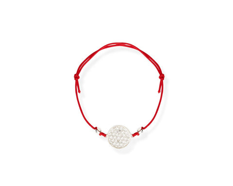 2. Studio image of New Vintage by Kriss Flower Of Life Bracelet with red cord and silver charm, showcasing intricate design