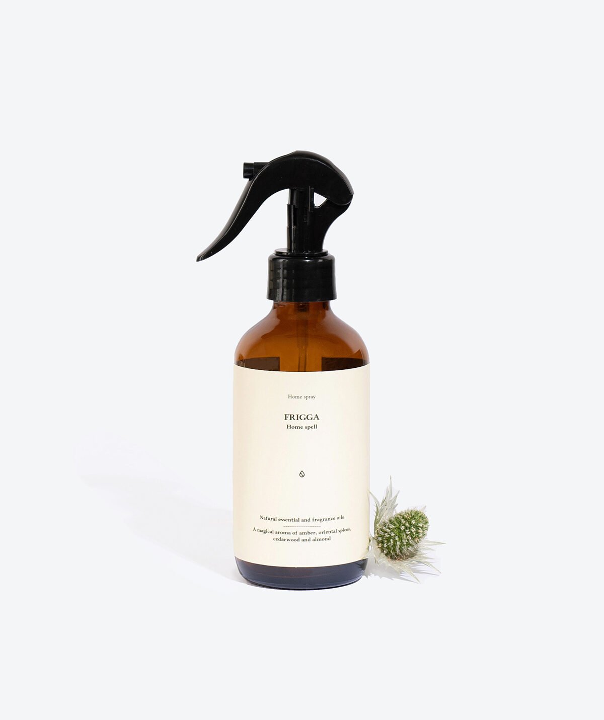 2. Smells Like Spells FRIGGA home spray with decorative plant, studio setting