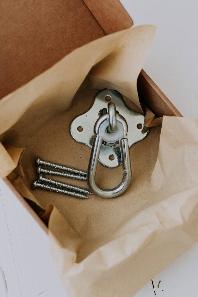 1. HopOn Swing Hanger by Nofi KIDS with screws in a box, suitable for wooden ceiling installation