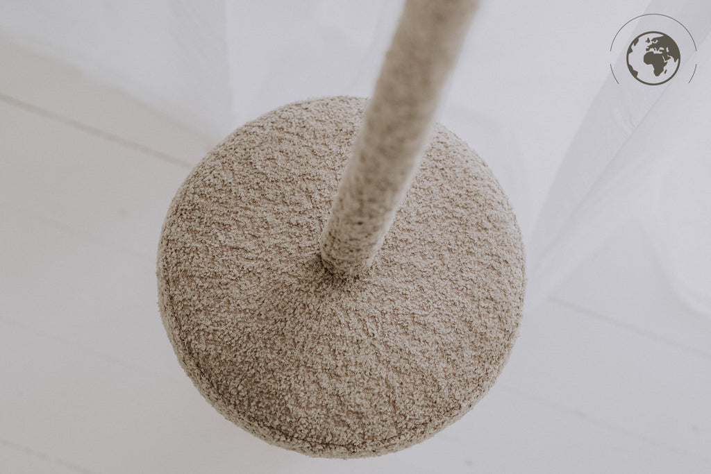 5. Top view of bouclé sand swing seat with cotton rope in bright room