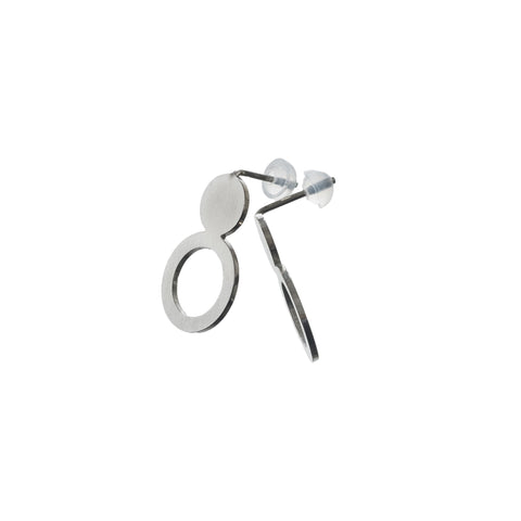 4. Studio shot of Lentsius Arc silver earrings with silicone stoppers, showing innovative design and craftsmanship